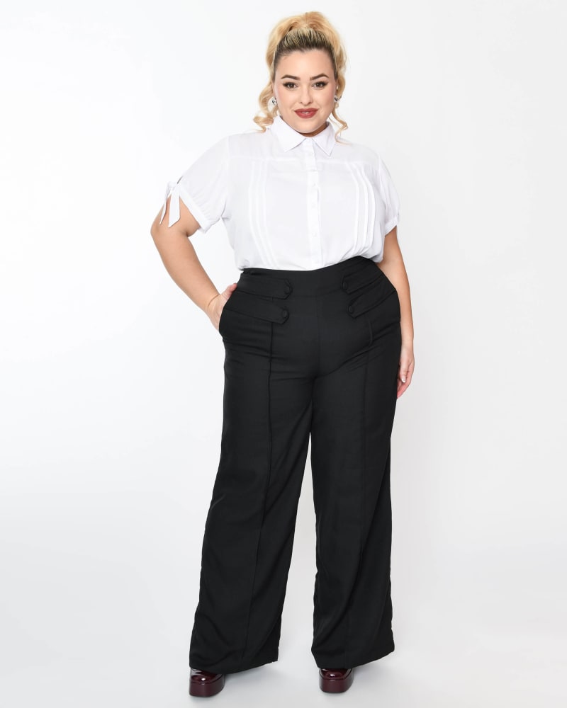 Front of a model wearing a size 1X Unique Vintage Black High Waist Wide Leg Tab Pants in Black by Unique Vintage. | dia_product_style_image_id:333378
